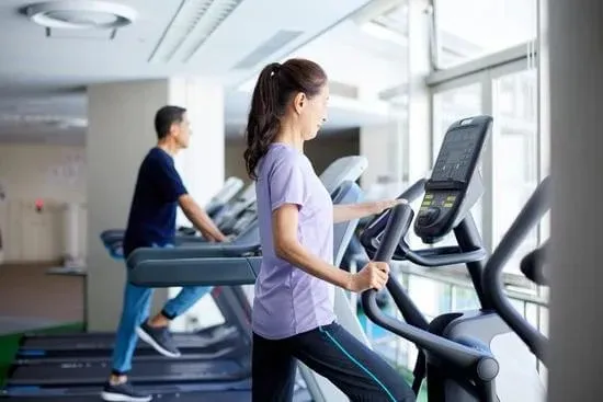 Workplace wellness implementation showing team practicing mindful breaks together